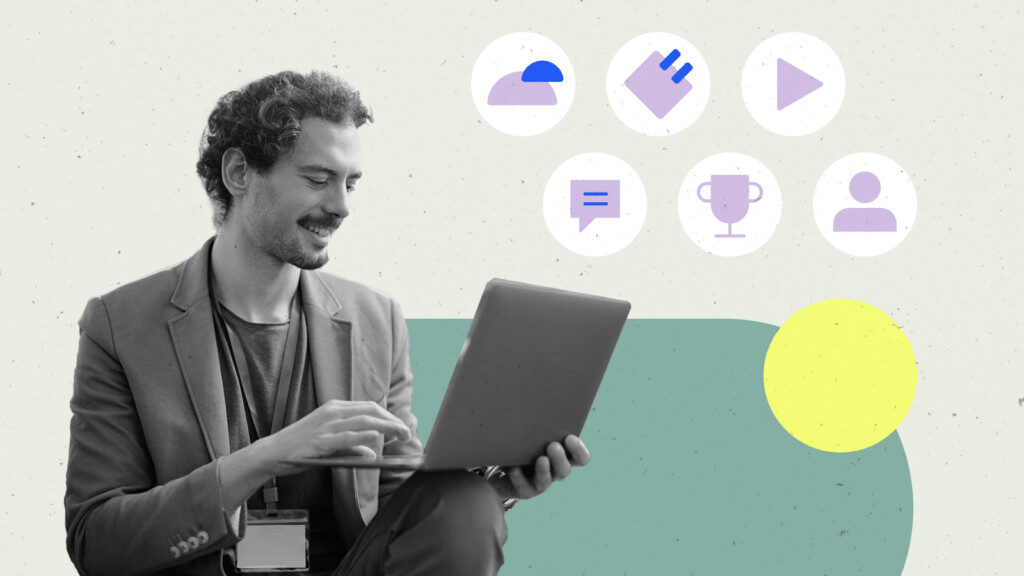 Man using laptop with digital icons background.